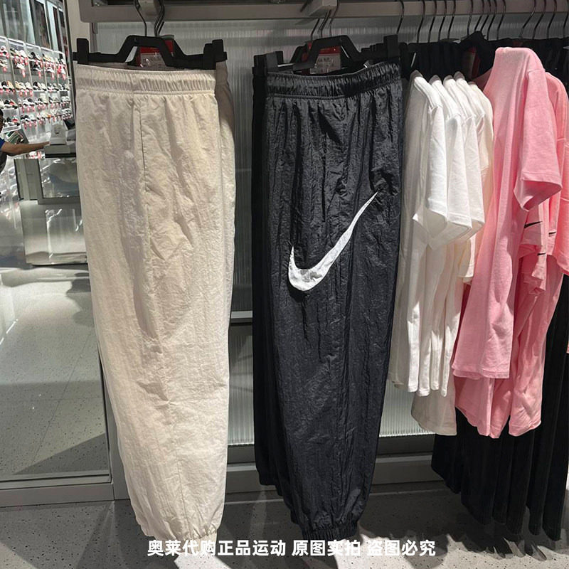 正品Nike/耐克女子春夏运动大勾logo休闲松紧梭织束脚长裤DM6184