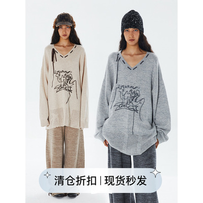 骆驼图案提花手工流苏毛衣