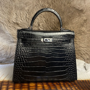 真皮皮包2026梯形包包女包时尚泰国进口皮料黑色鳄鱼皮手提凯莉包
