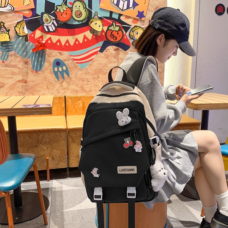 初中生书包女大容量韩版高中生大学生简约减负背包休闲旅行双肩包