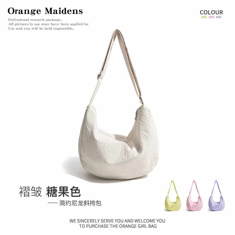 橙子少女棉麻肌理感饺子包