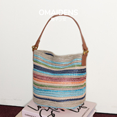 橙子少女彩虹草编包度假风海边沙滩编织包大容量单肩斜挎水桶包