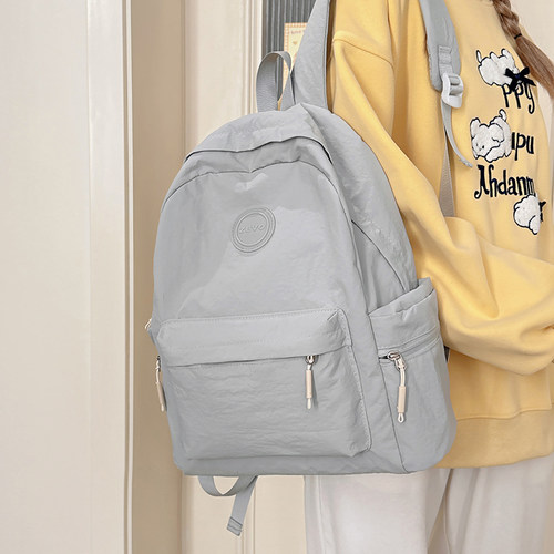 简约双肩包轻便大容量背包潮书包