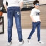 Quần jeans bé trai xuân thu mới 12 bé lớn mùa hè quần bé trai 10 quần bé ngoại mỏng thủy triều 15 tuổi - Quần jean quần jean nam mùa đông 1-7 tuổi