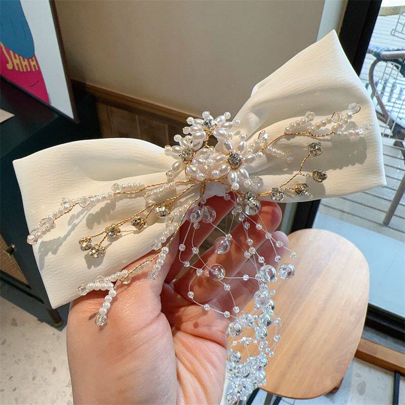 森系头饰婚纱发夹韩国新娘超仙写真蝴蝶流苏发饰串珠白纱水晶结