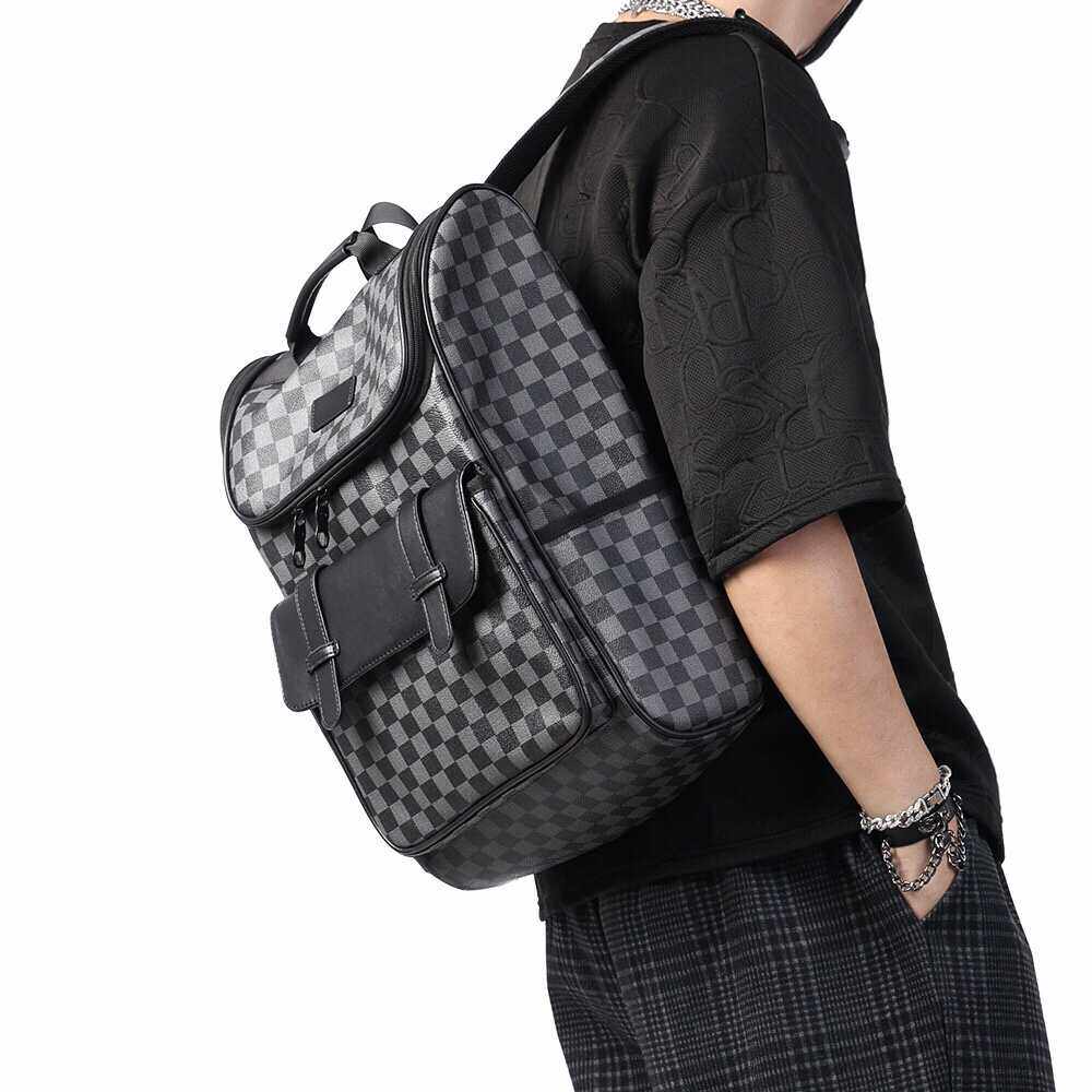 男士欧美风牛皮花纹格子双色双肩包大容量潮流时尚旅行背包电脑包