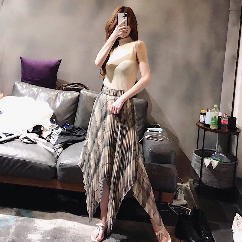 格纹下摆不规则飘逸灵动风半身裙