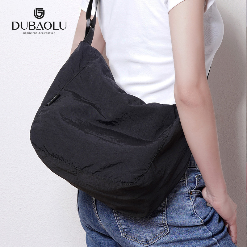 新款时尚潮流气质百搭日常通勤轻便简约饺子包大容量单肩斜挎包