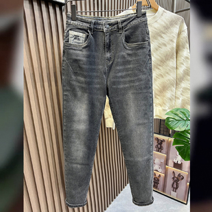 设计高级感烟灰色弹力牛仔裤男春秋季薄款修身潮牌男士裤子小脚裤