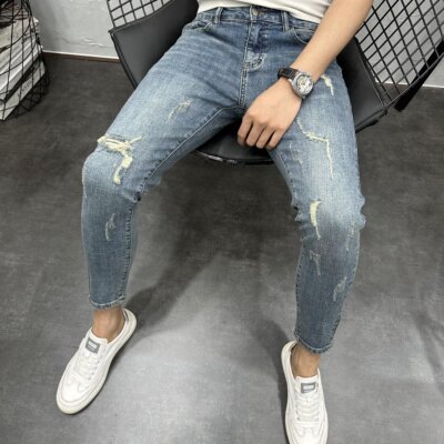 破洞水洗浅蓝弹力修身小脚九分裤