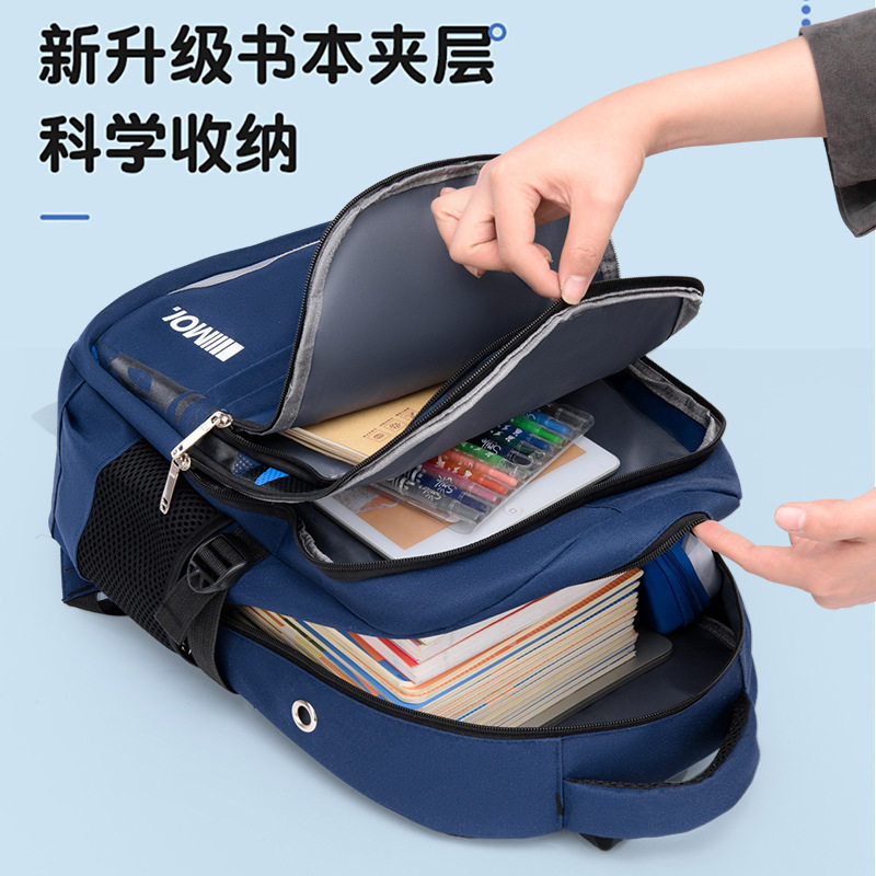 新款小学生书包男孩大容量多层轻便减负护脊3-6-9年级双肩包
