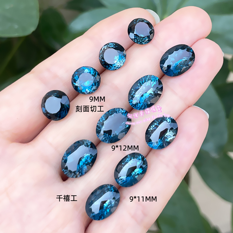 天然托帕石裸石戒面 椭圆形9*11MM 伦敦蓝千禧工托帕石原石