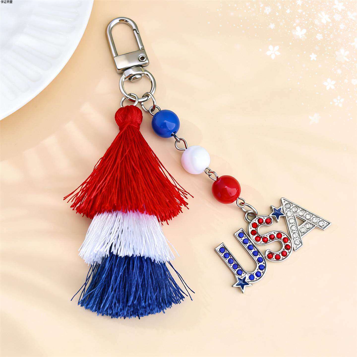 2026新品创意设计独立日流苏钥匙扣自由日旗帜色包包手工挂件挂饰