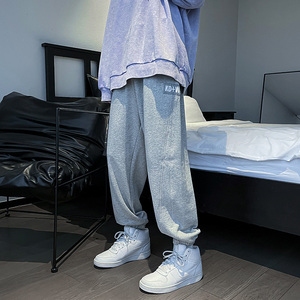 主推款2021简约休闲卫裤男港风九分束脚裤秋款哈伦裤,黄色外套背心好搭配吗图片