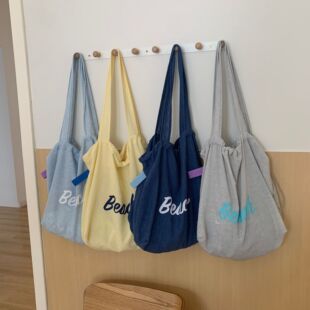 韩系小清新单肩抽绳棉麻帆布包青春校园风少女上课轻便简约购物袋