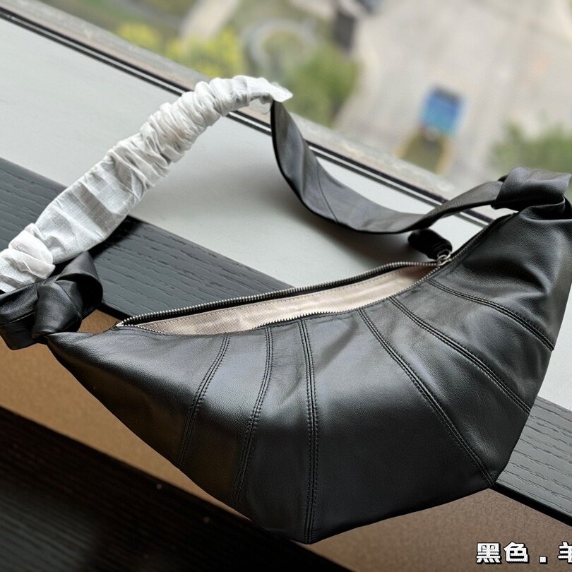 羊皮牛角包宽肩带时尚休闲挎包百搭大容量男包女包小众简约饺子包
