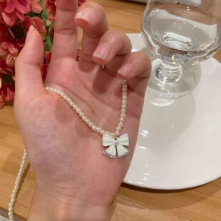 甜美少女珍珠蝴蝶结吊坠项链女款气质时尚百搭小众设计高级锁骨链