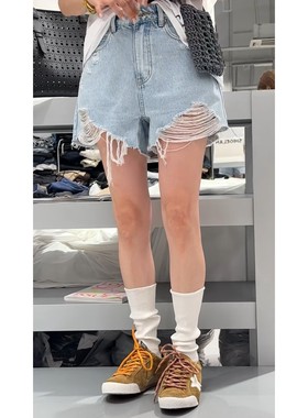秒发诗歌兰58330时髦爆款浅蓝色破洞毛边牛仔短裤25秋季新款女装