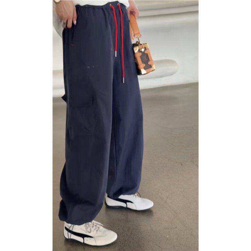 秒发诗歌兰25-291潮流巨美蓝色松紧腰速脚口袋工装裤25秋欧货女装