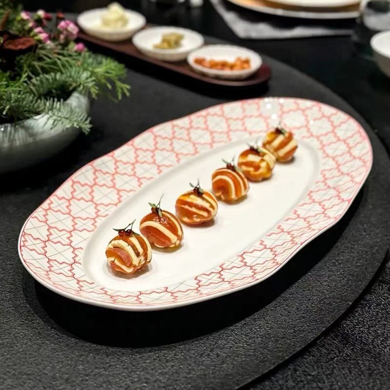 酒店特色餐厅陶瓷餐具凉菜盘红色格高级感会所椭圆点心摆盘鱼盘子