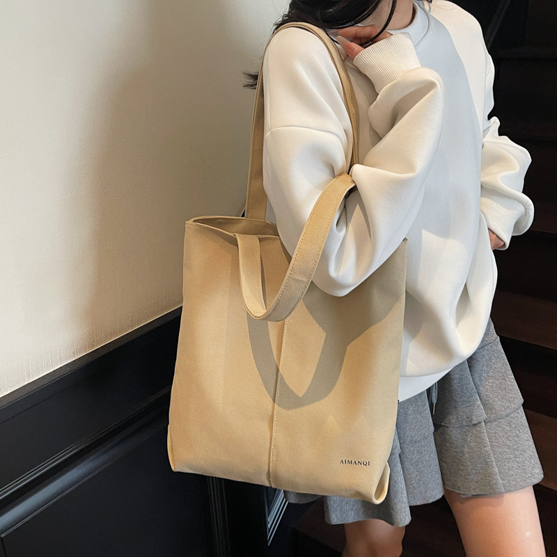 2025新款女大学生上课装书单肩包休闲简约通勤托特包大容量手提包