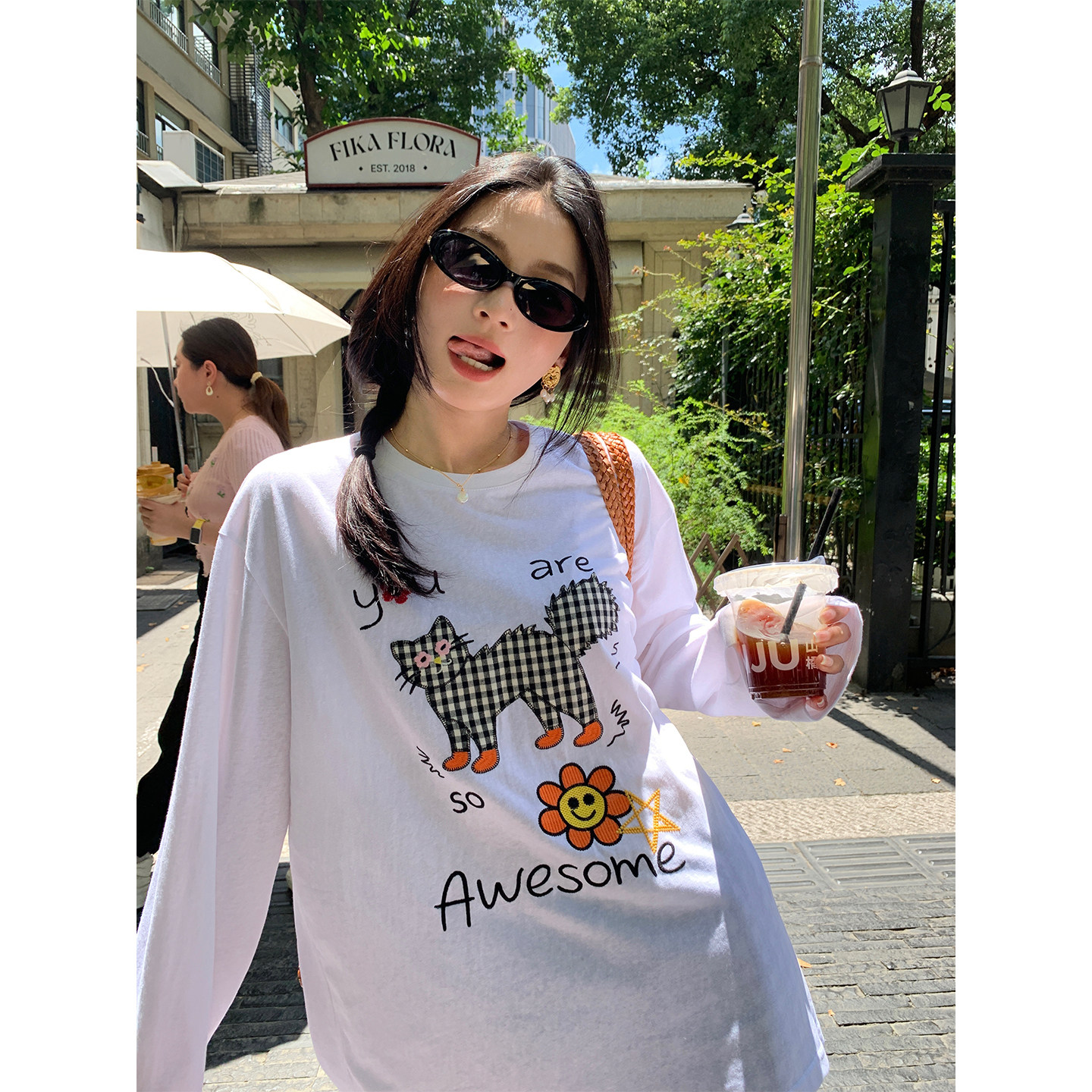 落落狷介白色长袖T恤女宽松图片