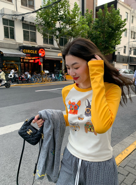 落落狷介 早秋上衣2025新款设计感印花长袖T恤女小个子拼接黄色