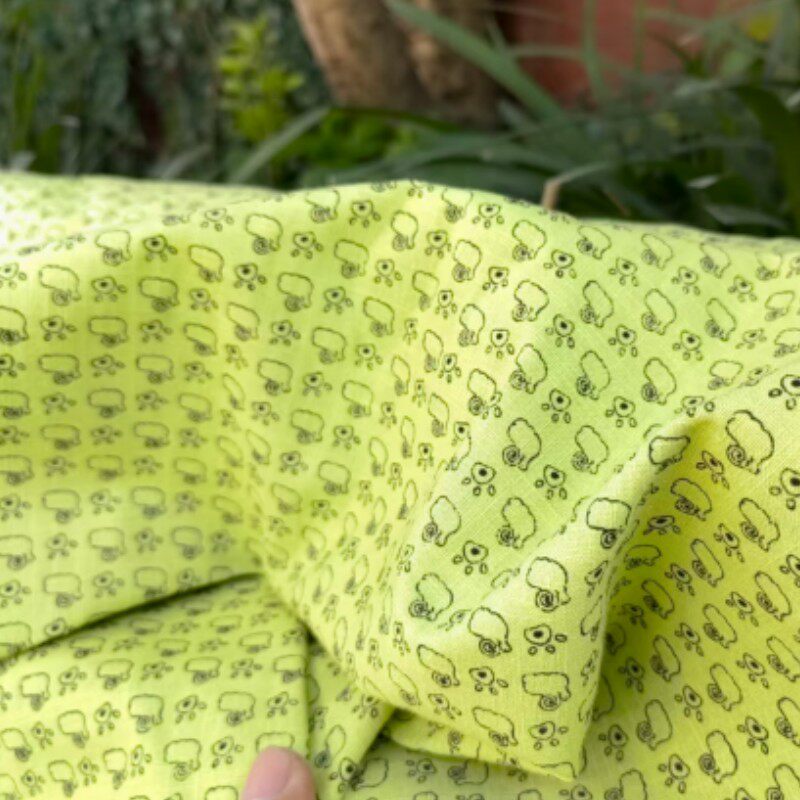 竹节印花卡通黄绿色蜗牛粉嫩麻棉手工制作抱枕坐垫女裙子厚布面料