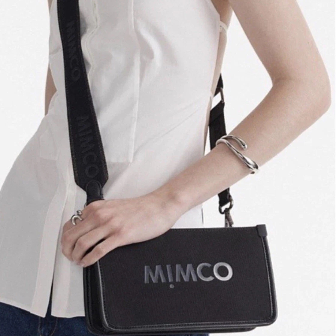 澳洲时尚轻奢黑色帆布枪色五金拉链小方包斜挎包