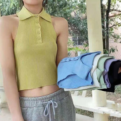 Sexy hot girl with open neck, high waist and small suspender knitted top and vest