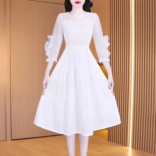 春季2026新款白色荷叶边袖连衣裙女收腰中长款气质裙轻奢高级感
