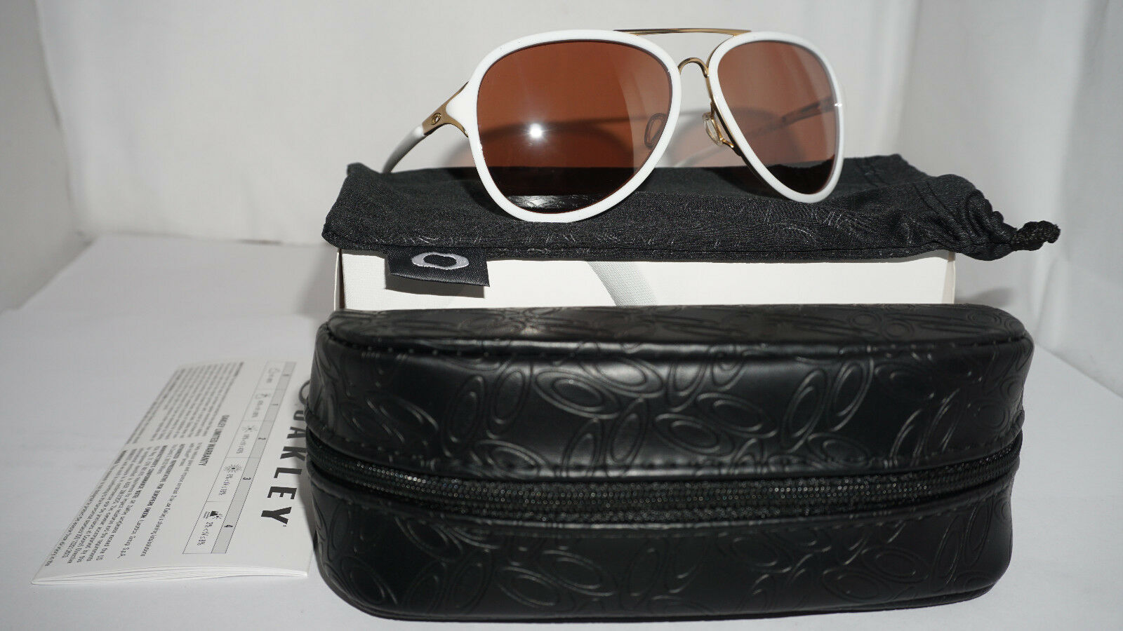 代购Oakley欧克利KICKBACK太阳眼镜金色白色VR28黑镀铱OO41021325.00元包邮