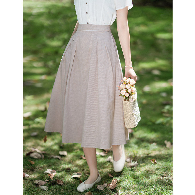 纻衣杏色格纹文艺半身裙女2025夏装新款A字半裙百搭显瘦中长裙子,女装/女士精品,半身裙,淘宝优惠券,粉丝福利购,淘宝优惠卷