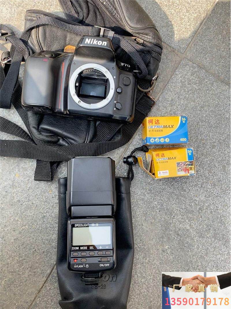 尼康f70相机及尼康sb-28闪光灯打包出,带两个柯达胶卷.询价