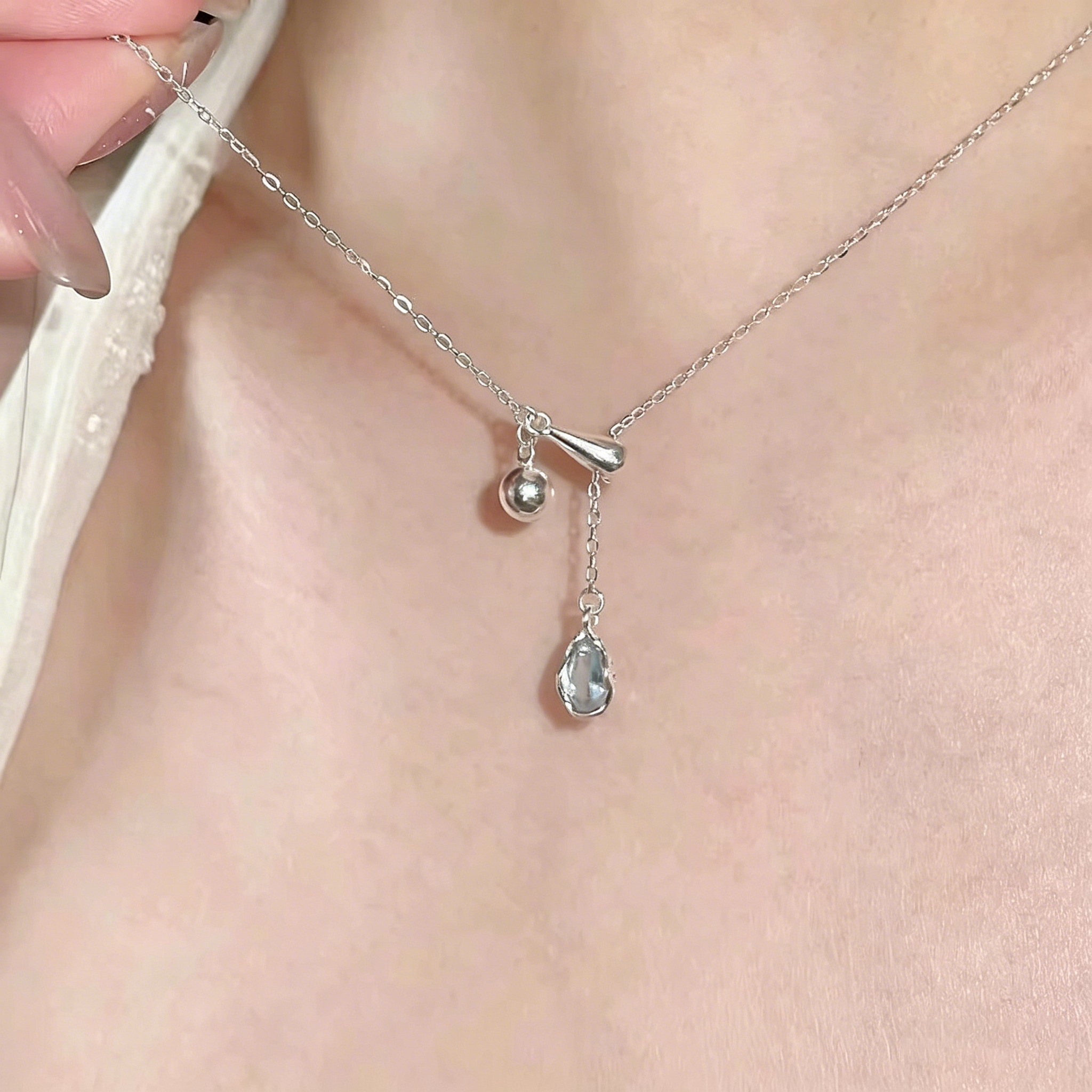 S925纯银海蓝宝项链女蓝色眼泪水滴流苏锁骨链轻奢小众生日礼物