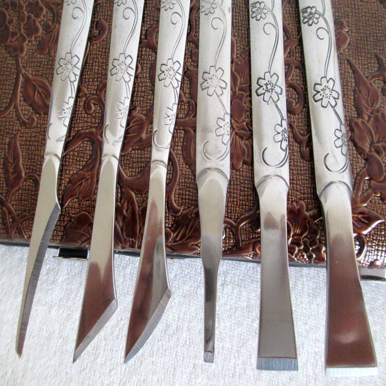 무료 배송 정통 양주 절묘하게 조각 된 18 조각 흰색 강철 페디큐어 칼 세트 페디큐어 도구 손톱 가위