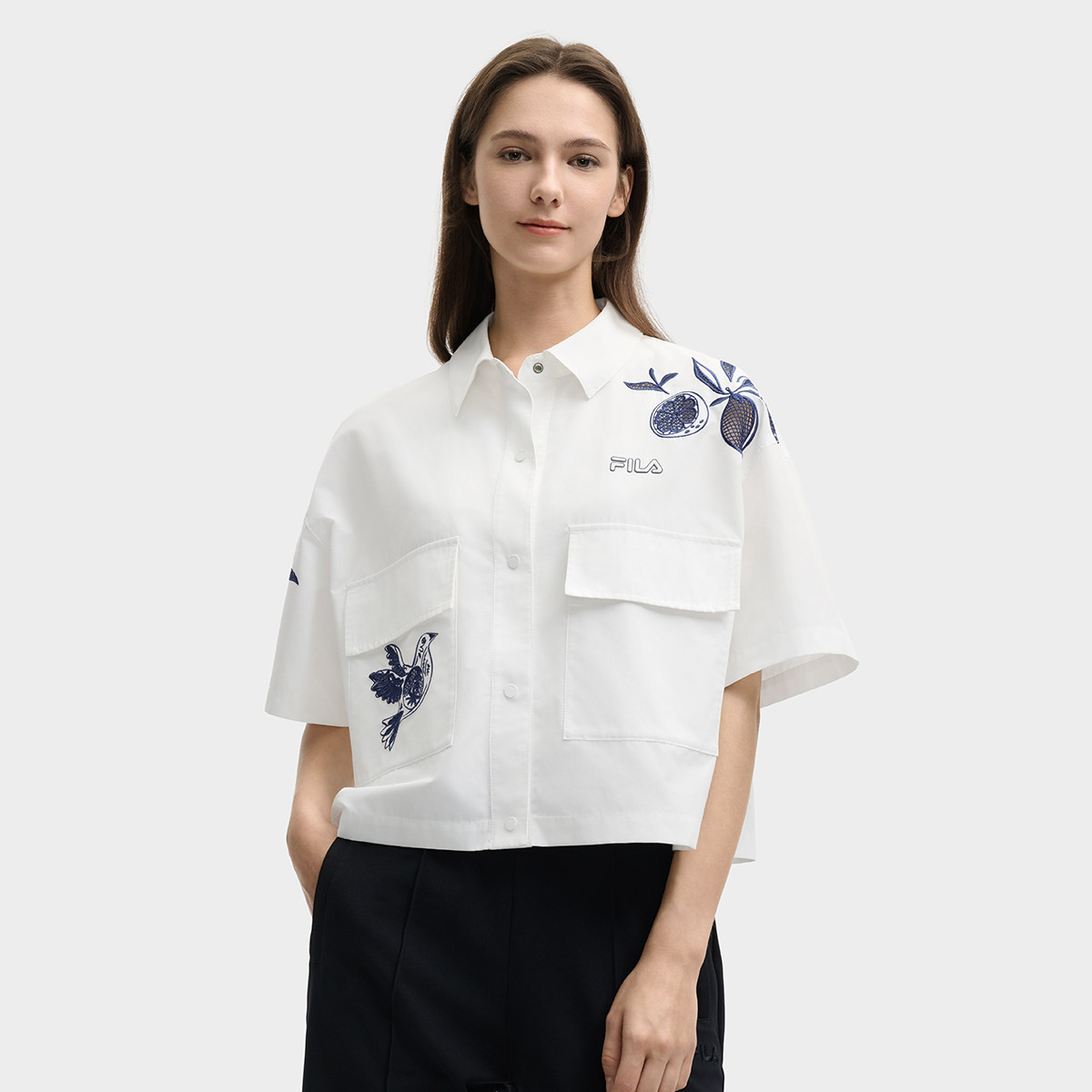 Fila/斐乐夏季新款女子户外时尚休闲运动短袖梭织外套F11W528708F