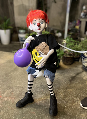 提线木偶人吹气球的少年创意表演