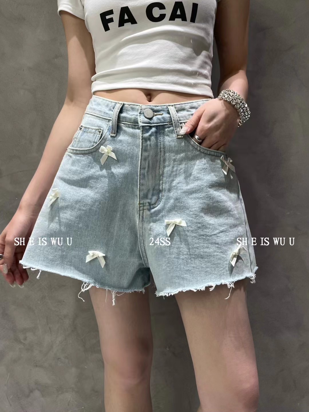 WUU夏季新款韩国设计感蝴蝶结直筒裤洗水毛边辣妹阔腿牛仔短裤女