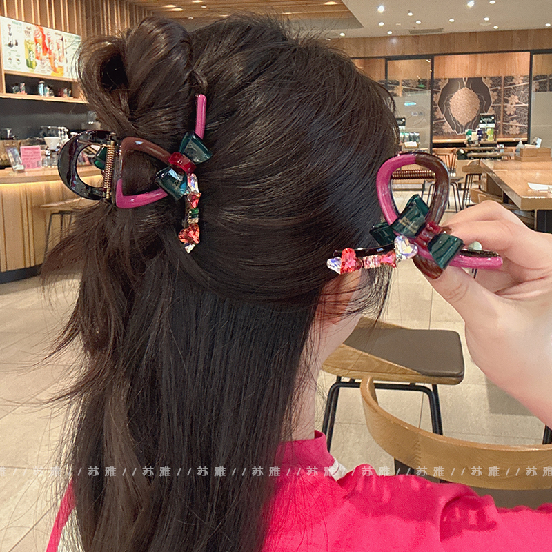 金标蝴蝶结撞色盘发抓夹爱心彩钻