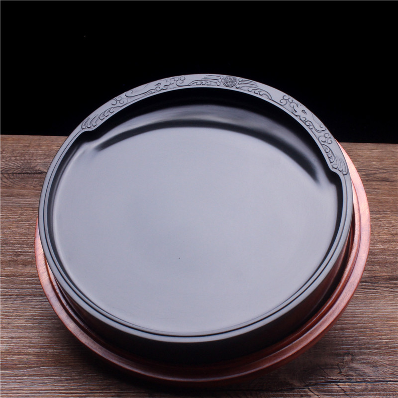 歙砚名师精品砚台老坑籽料黑龙尾原石圆形素砚池实用收藏端砚艺术