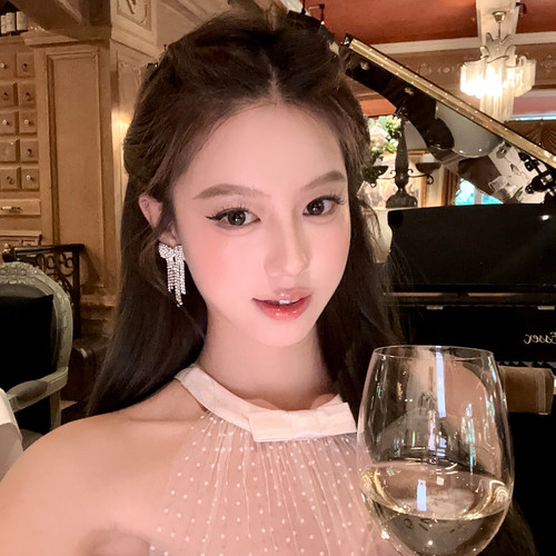 流光舞曲满钻蝴蝶结流苏耳环