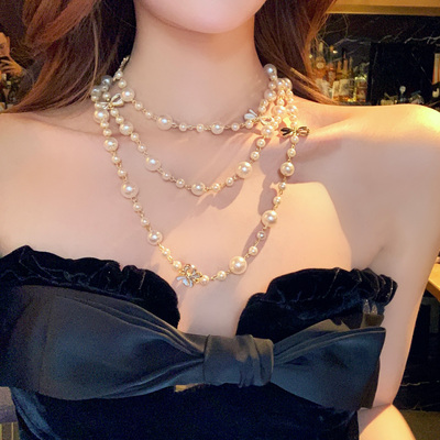粉雾黛丽双面蝴蝶结珍珠项链