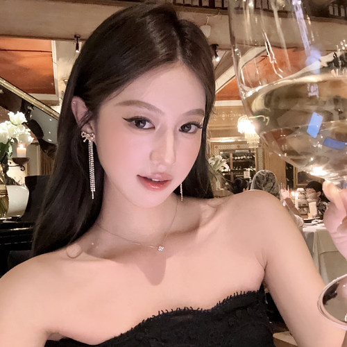 矜贵美神后挂式蝴蝶结流苏耳环