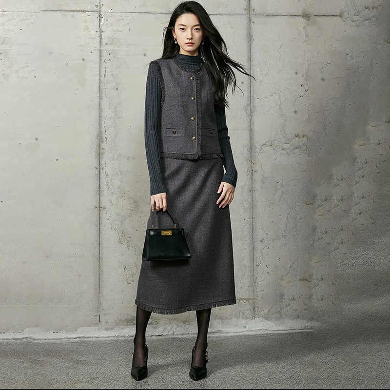 韩系列老钱风套装899元马夹+半裙