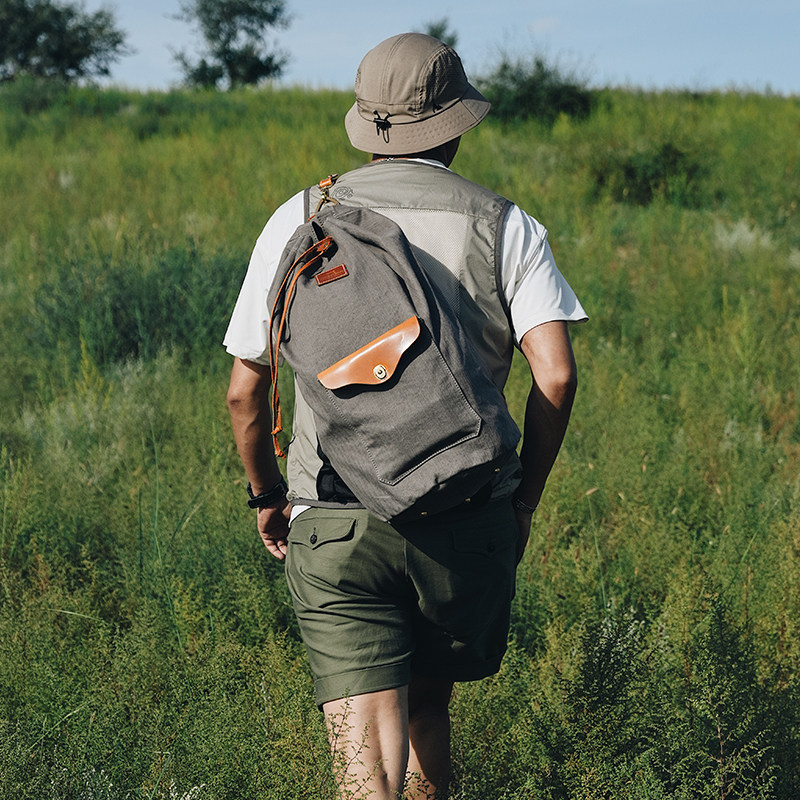 HKWORKSHOP联名纳厮单肩斜跨背囊水桶包帆布休闲通勤露营户外包