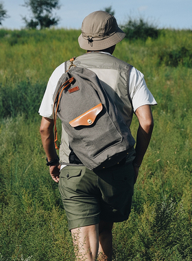 HKWORKSHOP联名纳厮单肩斜跨背囊水桶包帆布休闲通勤露营户外包