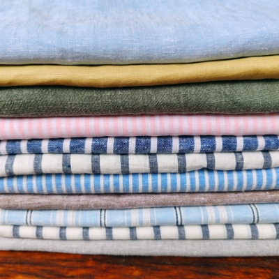 称斤瑕疵尾货清仓素色亚麻棉服装面料内衬手工DIY包包打版麻布料