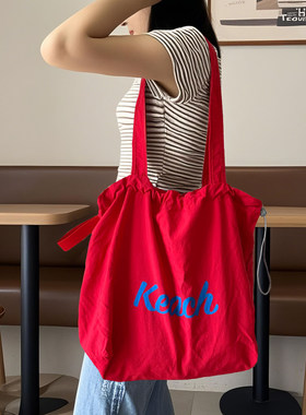 包包女韩版新款字母印花尼龙单肩包轻便休闲百搭抽绳大容量托特包
