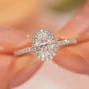 正品 莫桑石钻戒女椭圆形鸽子蛋925纯银镀白金高级感群镶仿真钻戒